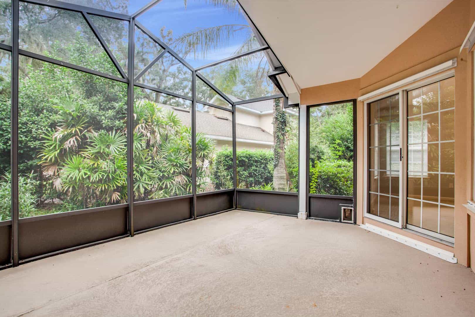 Empty Screened in Porch Attached to Modern House Outdoor No Furniture Home