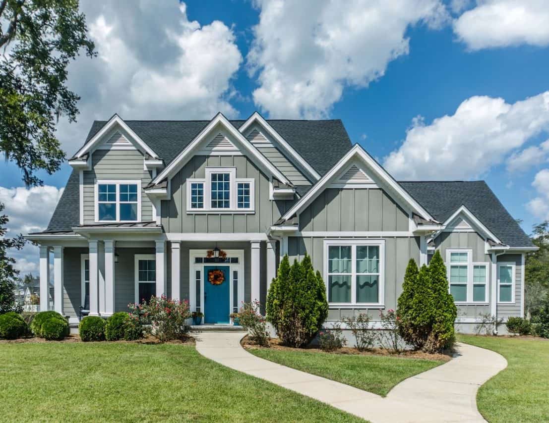 Gray New Construction Modern Cottage Home with Hardy Board Siding and Teal Door with Curb Appeal